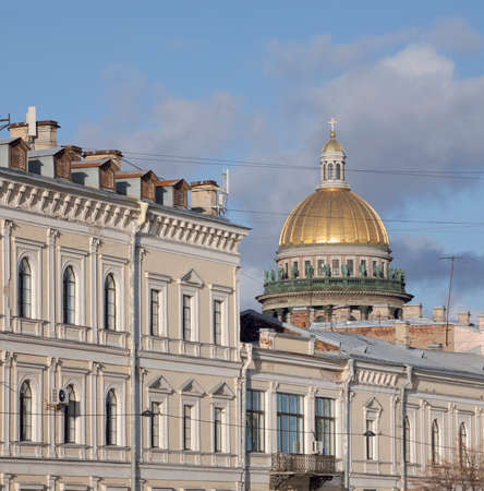 The dome of St. Isaac's Cathedral and the facades of old houses, St. Petersburg, Russia