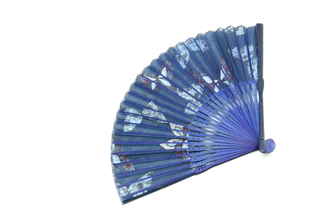 blue fanning paper on white backgroundの写真素材