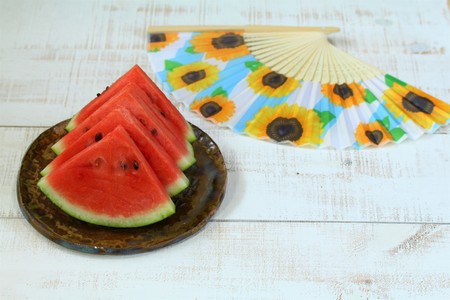Summer image, watermelon and folding fanの写真素材