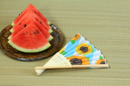 Summer image, watermelon and folding fanの写真素材