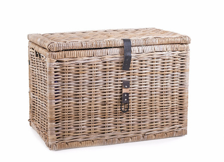 wicker thatched basket with leather clasp on a white background.の写真素材