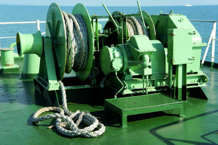 Roll machine for roll the big rope on the ship
