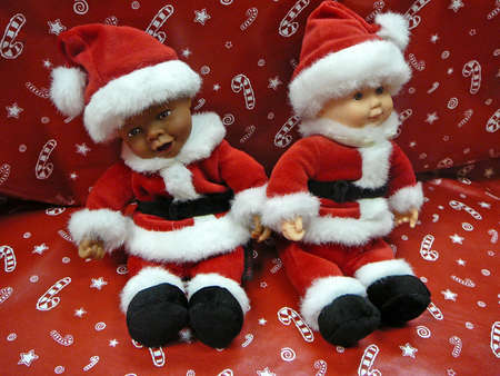  Santas on a candy cane backgroundの写真素材