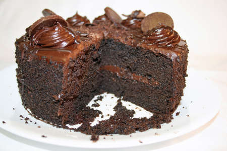 Chocolate cake with slice missingの写真素材
