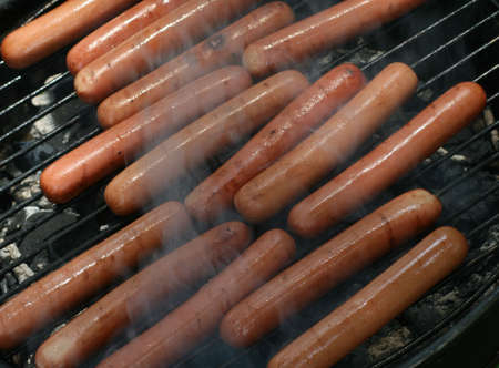 Hot Dogs on the Grillの写真素材