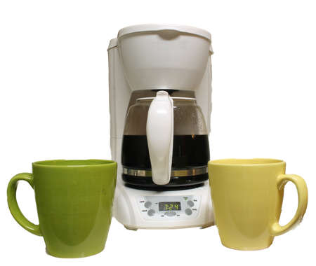 Coffee pot with mugs on white backgroundの写真素材