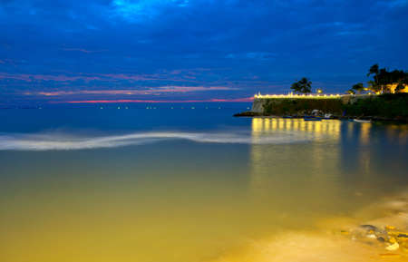 Nightly lights and the seaの写真素材