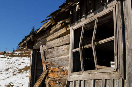 Dammaged old wooden houseの写真素材
