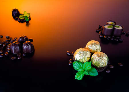 Composition of chocolate mint coffee sweets in dark colorsの写真素材