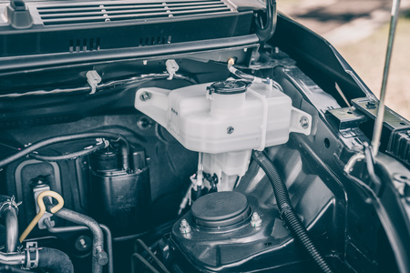 Putrajaya, Malaysia - February 17, 2019: New car perodua aruz engine look focusing on the water...