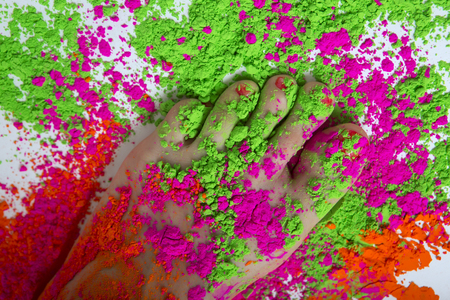 Happy Holi Festival! Holi Celebration Party - female feet colored Dry Bright Multicolor Paint Powder. Indian traditional spring color Festivalの写真素材