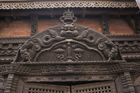 Beautiful old Wooden Door, Vintage antique Door with ornament in KATHMANDU, NEPALの写真素材