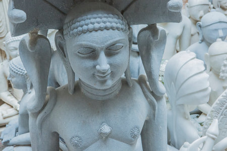 Statues of Hindu Gods and Goddess. Crafts and Arts of India. Murti handmade Manufacturing in Jaipur (Rajasthan). Indian God sculpture made of white marble. Ancient Traditions and Crafts of Indiaのeditorial素材