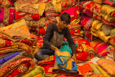JAIPUR, Rajasthan, India â DEC, 2016: Sari Shop. Indian Traditional Women's Luxury Sari clothing on Market on Dec, 2016 in JAIPUR, India. Jaipur - center of Traditional eastern Handicrafts of Indiaのeditorial素材