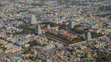 Top view of the Tiruvannamalai city and Arunacheshvara Temple. View of  Indian Shiva Temple from Arunachala hill. Beautiful Panoramic view of the holy city in Tamil Nadu. Spiritual and Religious of India.の写真素材
