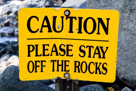 caution stay off the rocks.の写真素材