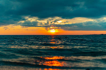 Sunset on the sea in summerの写真素材