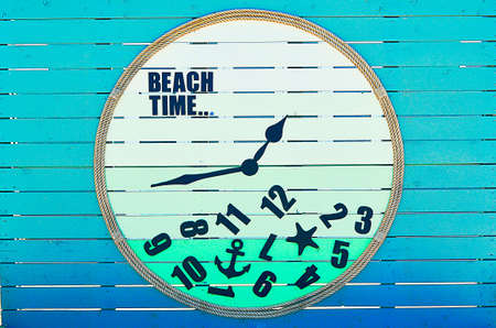 Creative clock on the beach.の写真素材