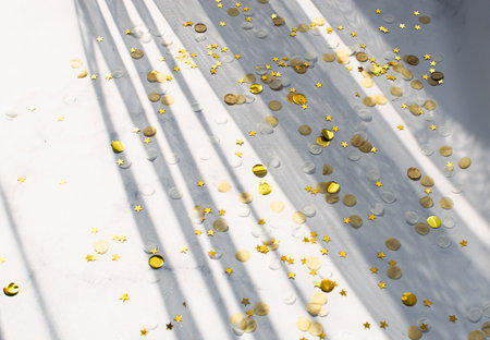 White holiday background with glitter, sparkle, candy decoration, line light, shadows. Flat lay, top view, copy space.の写真素材