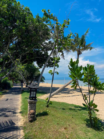 Stunning beautiful beach with relaxing scenery on a beach. Famous travel destination in Sanur, Bali, Indonesia. - stock photo. High quality photoの写真素材