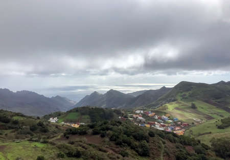 Green mountains in a fog - stock photoの写真素材