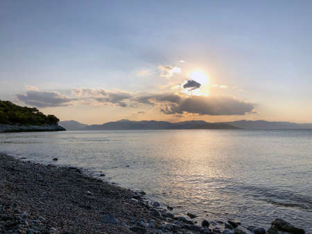 Beautiful sunset at the seaside, Greeceの写真素材