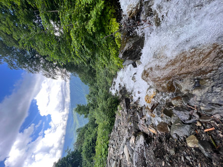 walk in the mountains on a sunny summer day, waterfall. High quality photoの写真素材
