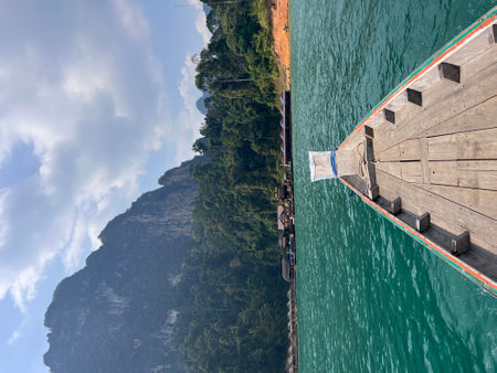 Karst mountains above clear blue water in Khao Sok national park, Cheo Lan lake, Thailand. Beautiful view. High quality photoの写真素材