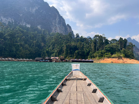Karst mountains above clear blue water in Khao Sok national park, Cheo Lan lake, Thailand. Beautiful view. High quality photoの写真素材