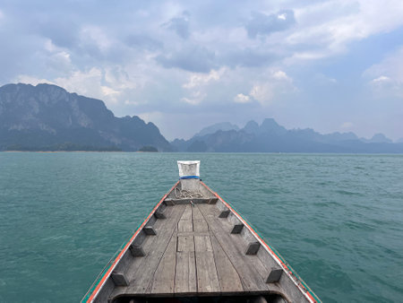Karst mountains above clear blue water in Khao Sok national park, Cheo Lan lake, Thailand. Beautiful view. High quality photoの写真素材