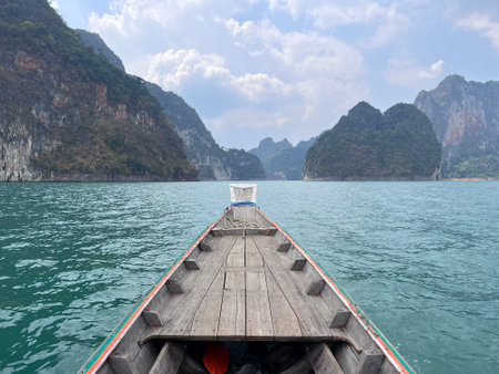 Karst mountains above clear blue water in Khao Sok national park, Cheo Lan lake, Thailand. Beautiful view. High quality photoの写真素材
