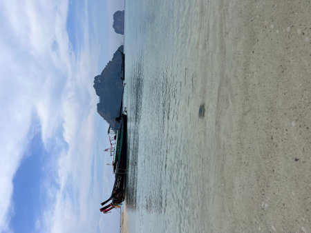 Scenic beach and Andaman sea in Railey Bay, Thailand, boats, cloudy. High quality photoの写真素材