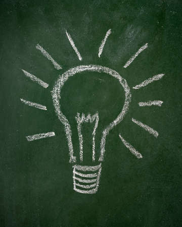 Lightbulb Drawn on a Chalkboardの写真素材