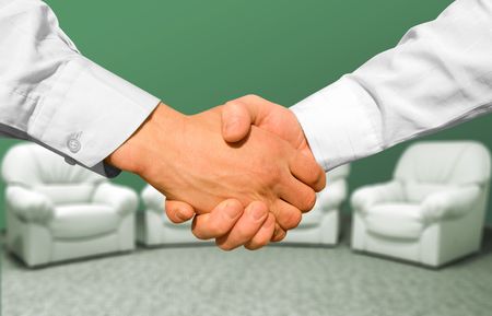 Businessman teamwork partners shaking handsの写真素材