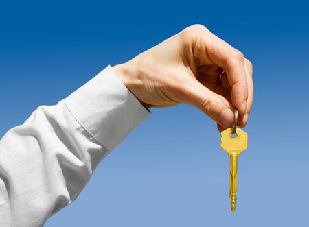  key in a palm over white background