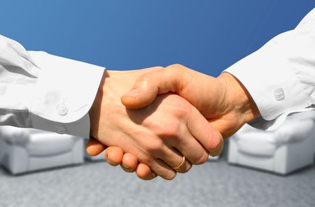 Businessman teamwork partners shaking handsの写真素材