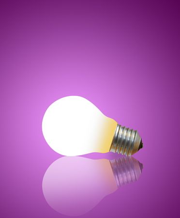 lighting lamp on a green backgroundの写真素材
