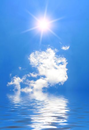sky and the sun on a seaの写真素材