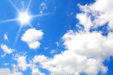 sky and the sun on a seaの写真素材