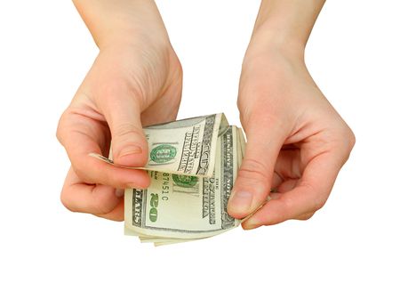money with hand isoalted on whiteの写真素材