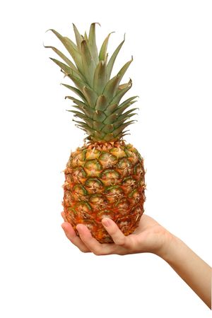 A ripe pineapple isolated on whiteの写真素材
