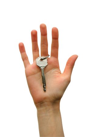  key in a palm over white backgroundの写真素材