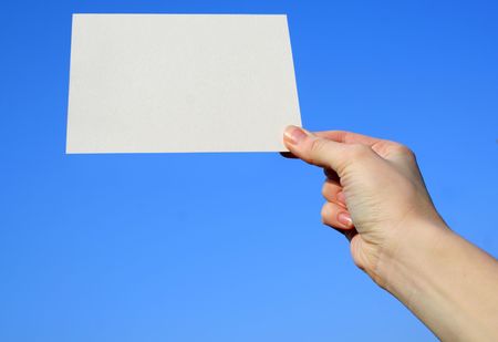 a card blank in a handの写真素材