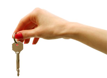  key in a palm over white backgroundの写真素材
