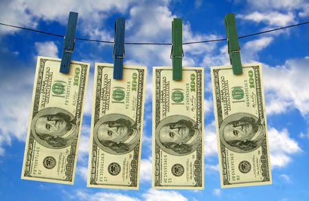 one hundred dollars dry on a ropeの写真素材