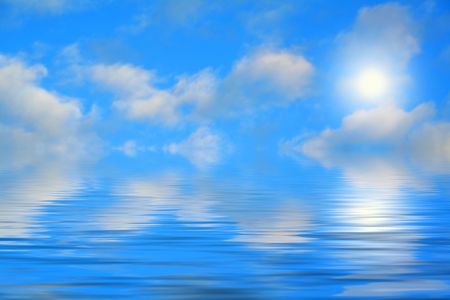 sky and the sun on a seaの写真素材