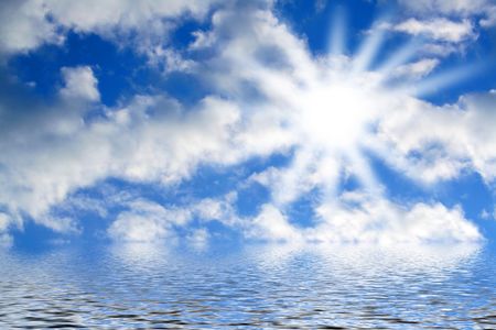 sky and the sun on a seaの写真素材
