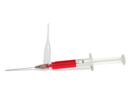 one syringe on the whiteの写真素材