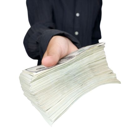 money in a  businessman hand on the whiteの写真素材