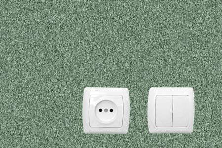 Alone outlet on yellow wallpaperの写真素材